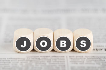 Vier Wuerfel mit der Aufschrift Jobs